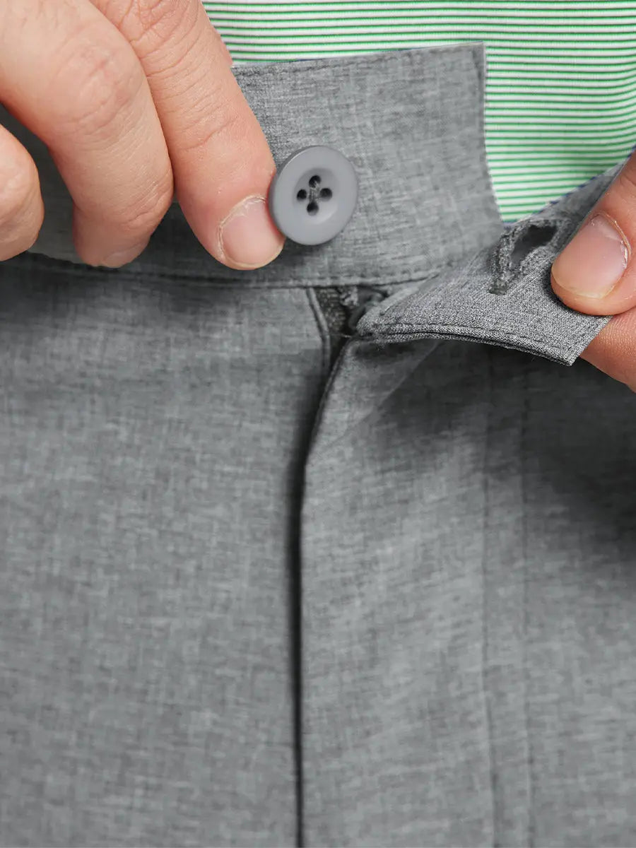 LIGHT GREY 9 Inch Heather Performance Golf Shorts close-up of waistband being stretched to show elasticity