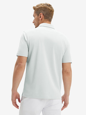 Back half-body view of model wearing the silver gray ventilated pique performance polo, highlighting the rear silhouette