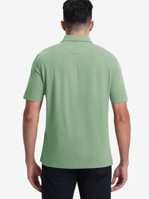Back half-body view of model wearing the spa green heather comfy cotton blend polo shirt with pocket, highlighting the rear silhouette
