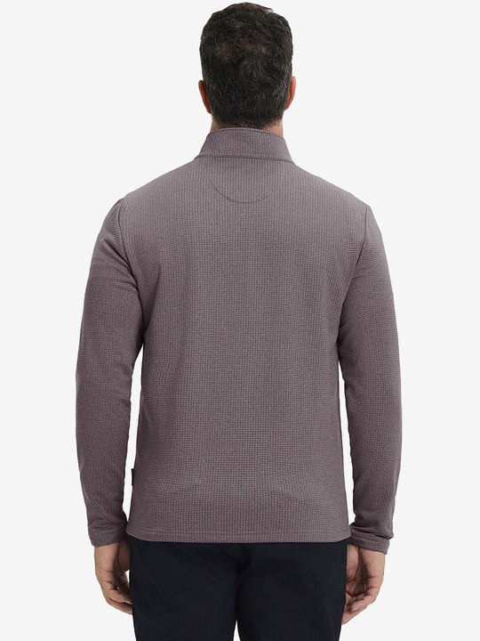 Back upper view of casual fleece lined quarter zip pullover in drak red, showing fit and seams.