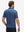 Back half-body view of model wearing the american elements 4 way stretch print collared polo shirt, highlighting the rear silhouette