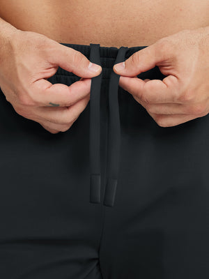 Front waistband detail of Water Resistant Comfy Fleece Golf Joggers in black