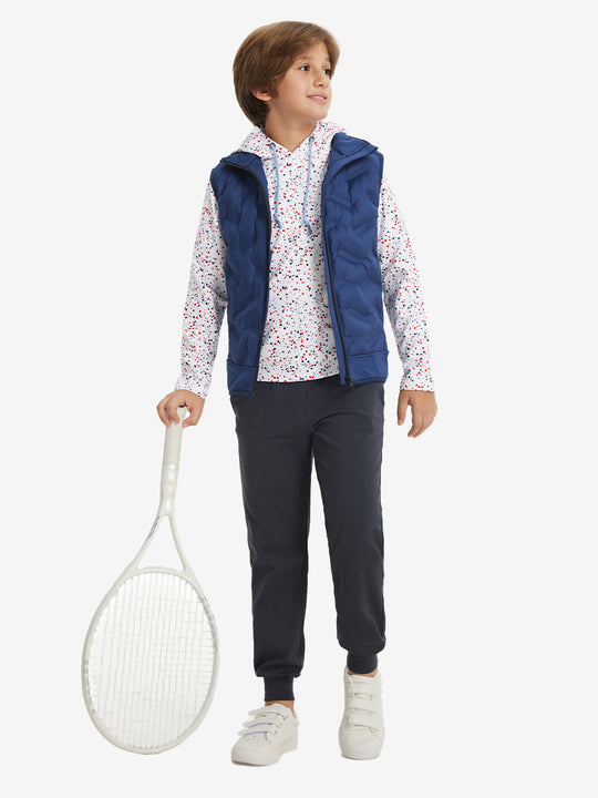 Model posing with golf club in youth full print hoodies pullover, white polka dots.