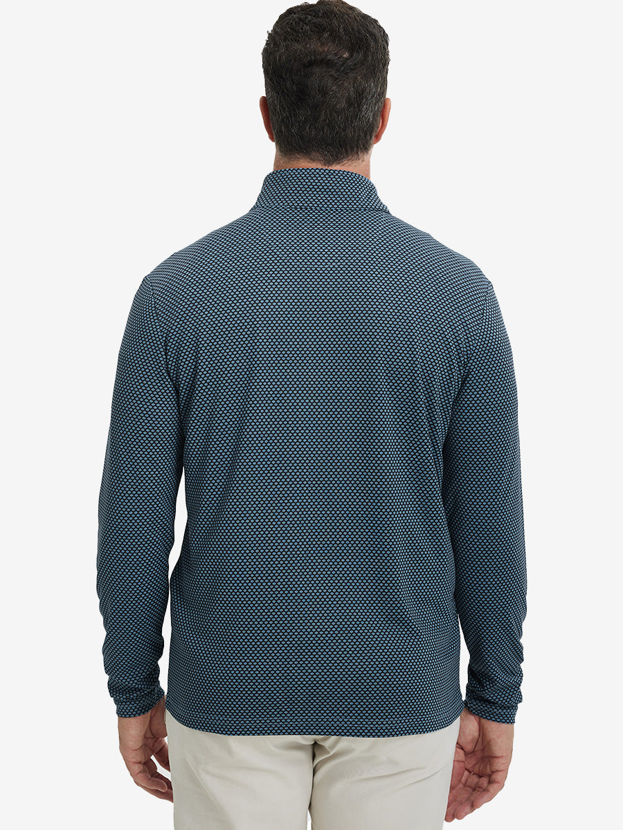 Back upper view of model wearing jacquard quarter zip pullover in black/blue, showing clean seam lines.