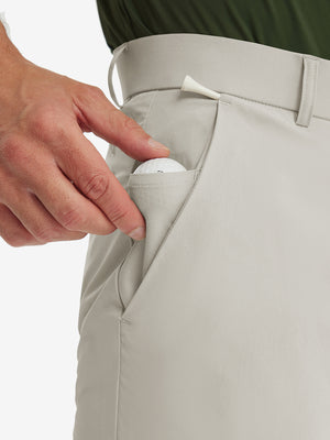 Detail shot of the side pocket on the light khaki stretch soft flat front dress golf shorts, showing functionality