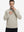 Front upper body view of model wearing lightweight golf quarter zip pullover in khaki light, relaxed fit.