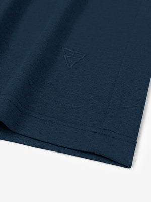 Hem detail of Men’s Long Sleeve Mock Turtleneck Shirt in Navy, showcasing smooth finish.