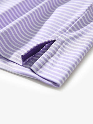 Close-up of hem slit on LAVENDER WHITE STRIPE shirt, tailored detail for stylish performance