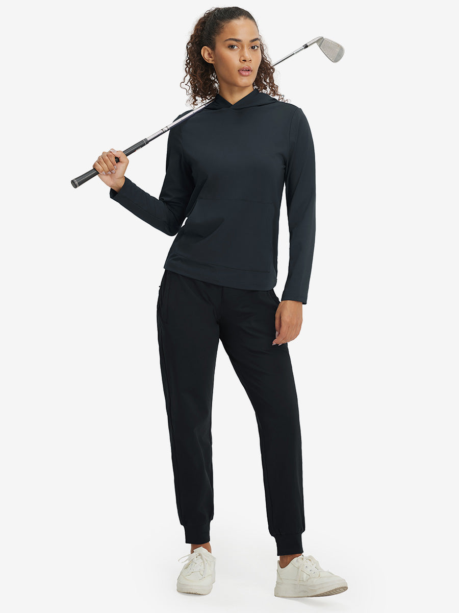 Model holding golf club, dressed in women's lightweight hoodies pullover in dark grey.