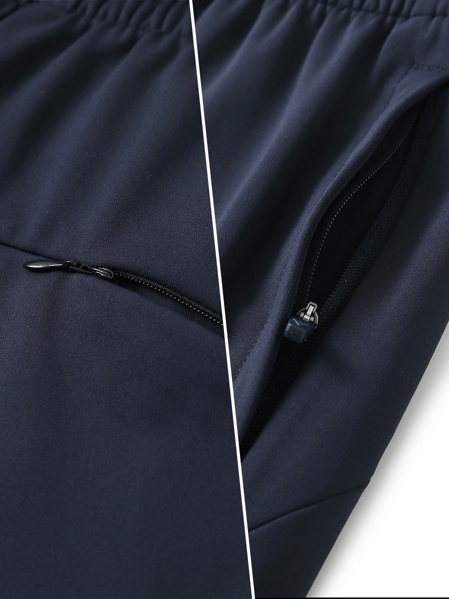 Two-part detail of lightweight women's stretchy joggers sweatpants zippers shown in navy.