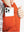 Close-up of boys full-zip fleece-lined puffer vest pocket holding a phone, practical detail in orange