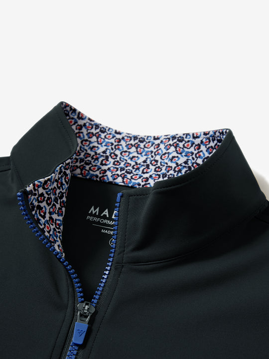 Zipper and inner pattern detail of the print collar quarter zip golf vest in dark grey, highlighting design.