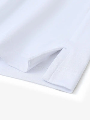 Close-up detail of hem slit on Everyday Solid Jersey Polo in WHITE, featuring precise stitching.