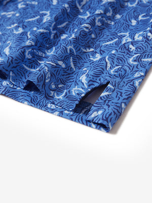 Hem slit detail of the line animal lightweight print long sleeve polo, showing fine stitching and finish.