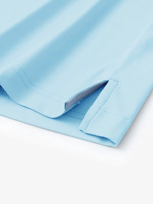 Hem slit detail of LIGHT BLUE Stylish Chest Print Snap Polo highlighting stitching and finish