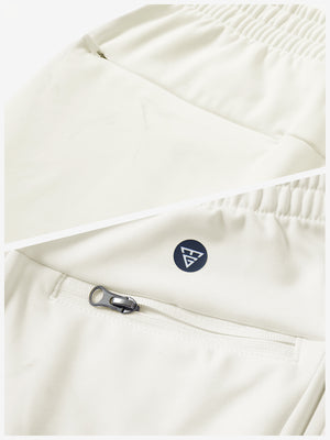 Close-up of the zipper detail of beige fleece stretch water resistant boys joggers.