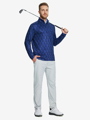 Man wearing Heather Pinstripe Brushed Dry Fit Quarter Zip Pullover in marina blue geo, holding golf club on course