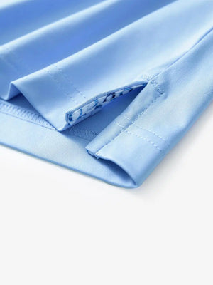 Close-up of side slit detail on the Light Blue Everyday Classic Solid Polo hem