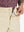 Close-up of waistband button and interior logo on LIGHT KHAKI Water Resistant Versatile 8 Pockets Shorts.
