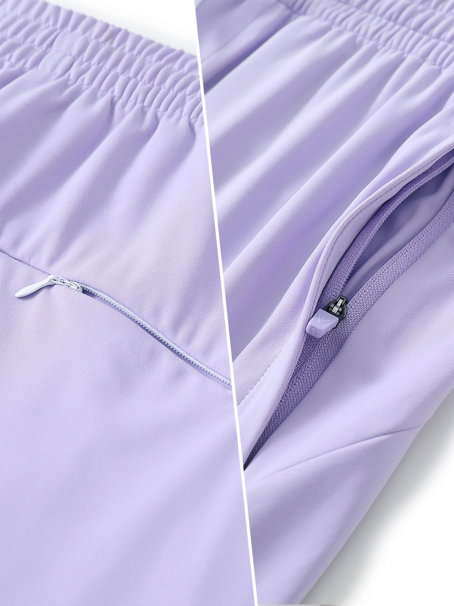 Two-part detail of lightweight women's stretchy joggers sweatpants zippers shown in lavender purple.