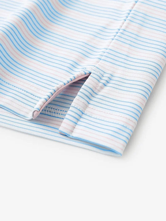 Close-up of side hem slit on Blue Pink Stripe Performance Stripe Golf Shirt