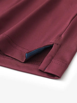 Close-up of side slit detail on BURGUNDY Chest Print Polo Shirts