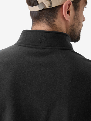 Close-up view of the logo on the back of the black heather pullover
