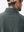 Close-up view of the logo on the back of the dark gray pullover