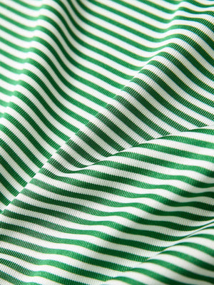 Fabric detail of Classic stripe polo shirts with crisp lines and smooth emerald stripe finish