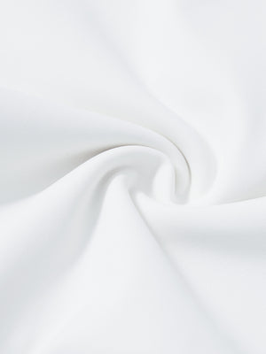 Fabric close-up of white lightweight ankle-zip sweatpants with 4 pockets, breathable performance material.