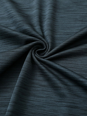 Close-up of jungle green heather texture polo fabric showing soft surface.