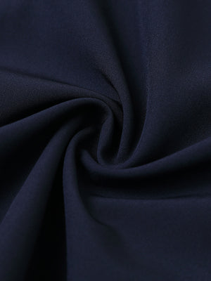 Fabric close-up of traditional breathable solid shirt, soft weave with airy navy finish