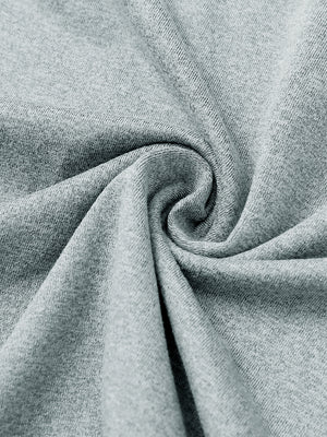 Close-up of melange fabric on quarter zip pullover, showing texture and detail in lunar rock melange.