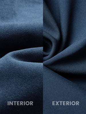 Close-up fabric detail of water-resistant fleece lined pants, soft inner lining and durable navy exterior