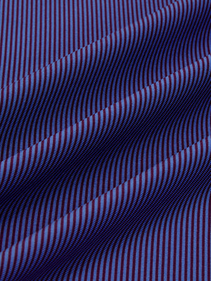 Close-up fabric view of long sleeve pinstripe jersey polo, smooth knit with subtle plum blue stripe stripes