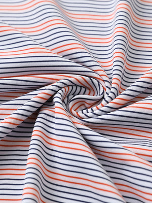Close-up fabric detail of performance stripe golf shirts, breathable texture with soft navy red stripe finish