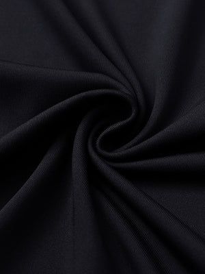 Close-up of black women's performance solid polo fabric texture.