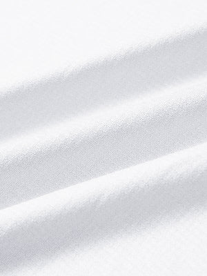 Close-up of white moisture wicking quarter zip pullover fabric texture