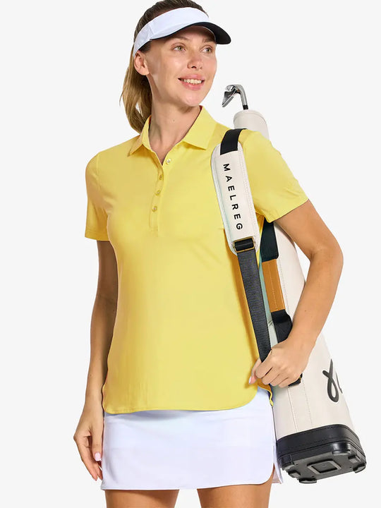 Front half-body of model in YELLOW Women's Performance Solid Polo holding golf club