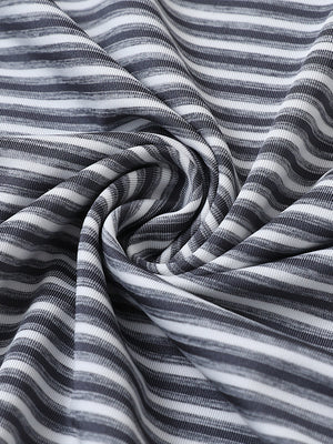 Close-up of dark grey stripe sport fit stripe polo fabric showing crisp horizontal stripes and smooth, breathable texture.