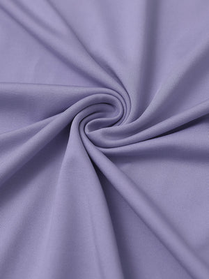 Close-up of fabric on everyday jersey henley shirt, soft knit texture with relaxed lavender tone