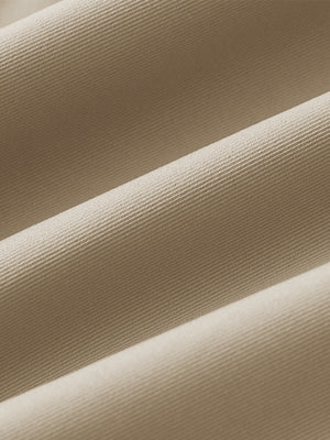 Fabric close-up of Women's 7/8 ankle golf track pants with soft texture in khaki