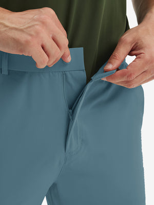 Detail view of the zipper on the blue stretch soft flat front dress golf shorts, highlighting secure closure