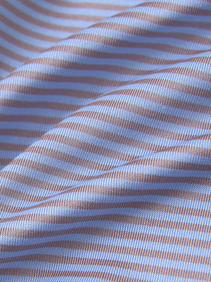 Close-up of bluishyellow stripe cooling stripe golf shirt fabric showing breathable texture and moisture-wicking stripes.