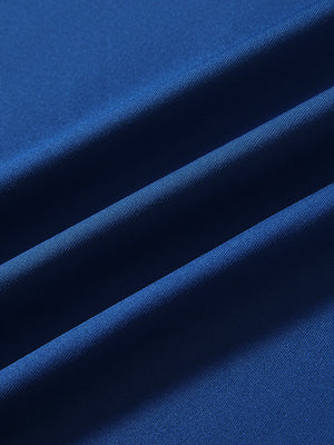 Close-up of klein blue long sleeve solid jersey polo fabric texture showing soft knit and smooth finish details.
