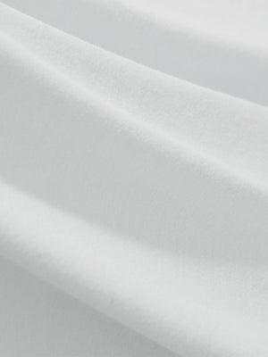 Macro view of the blue presence heather comfy cotton blend polo shirt with pocket fabric, showcasing the smooth texture