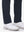 Detail view of hem and lower leg on navy women's regular fit stretchy golf pants