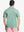Rear half-body shot highlighting fit of EMERALD Performance Ananas Jacquard Polo