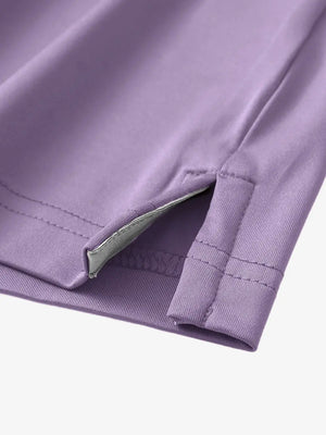 Close-up of side slit detail on Lavender Chest Print Polo Shirts