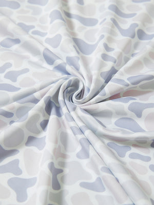 Close-up fabric detail of lightweight print long sleeve polo, breathable texture and soft feel in brown & grey camo